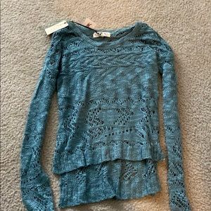 High-low sweater with holes